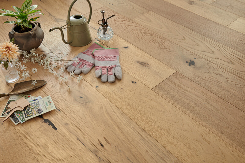 Hardwood floors needing care owing to dirt from planting