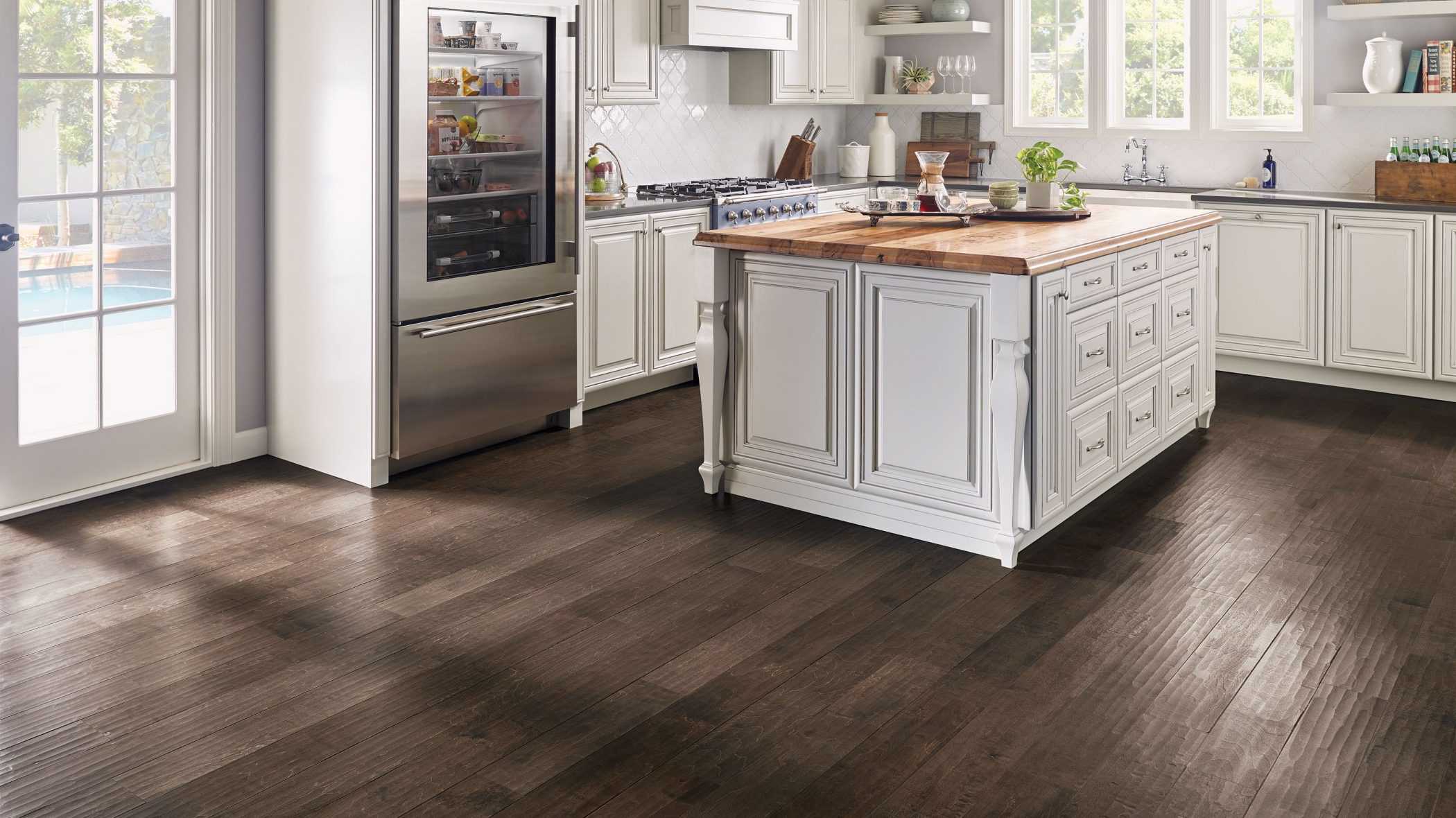 kitchen with an island and wood flooring