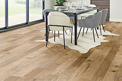 Hartco light tan flooring with dining room table and rug